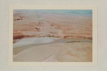 Up Bullfrog Creek.  The Henry Mountains are at upper right