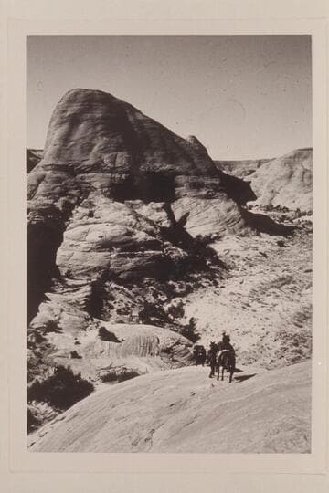 Down the last steep bald rock on trail between Moepitz Airfield and the basin north of Butte 5014