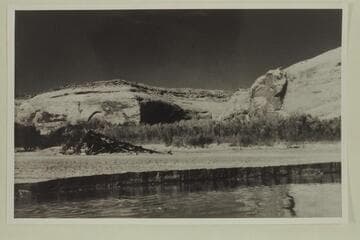 Portion of Stanton Dredge exposed above low water and silt bar. Mouth of "Wilson Creek"