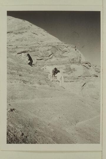 Tobe Owl climbs trail out of Moepitz Canyon between Moepitz Airfield and the basin north of Butte 5014