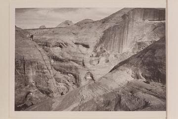 Up the canyon of the drainage which enters the river at Mile 71.5.  Moepitz Airfield is upper left