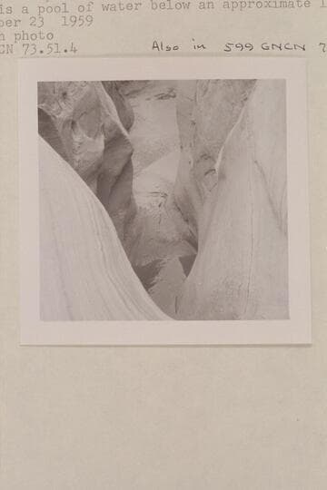 Down the dropoff in the southwest fork of 73. There is a pool of water below an approximate 15-20-ft. drop. Also in 599 GNCN 73.52.12