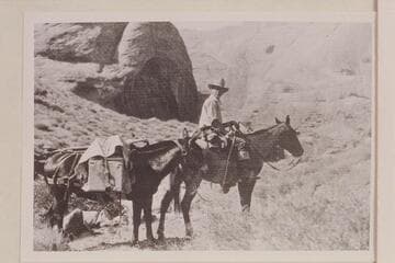 Packer and pack enroute to Rainbow Bridge. Party which placed the plaque