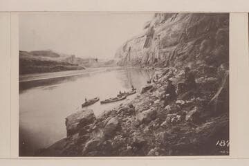 Stanton survey party in Glen Canyon above the San Juan River.  The man at extreme right is Stanton and McDonald sits just below