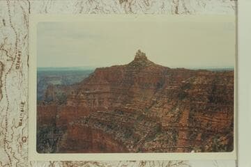 Maxson Butte northeast of Siegfried Pyre. The Board of Geographic Names has been petitioned to give the butte the name of John H. Maxson