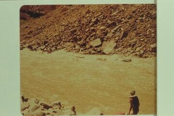 Larry Sanderson piloting the "Cactus" in Hance Rapid