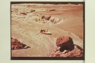 The "Susie R" runs Boulder Narrows.  Preliminary Lees Ferry gauge:  122,000 cfs.  Print sent by Reilly