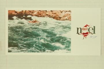 Jorgen Visbak's photo of one of the small inflated craft in Houserock Rapid. On the back he writes, "I believe it is from the head of Houserock that I am sending you my best wishes."