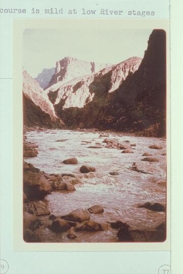 Les Jones running the foot of Sockdologer Rapid. The course is mild at low river stages