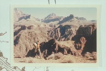 Knoll and Saddle (arrows) at Spur Trail as seen from west rim of lower Grapevine Vanyon