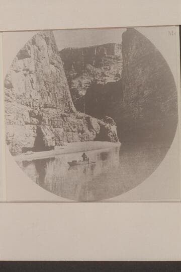 Beauty and Calm--A quiet stretch between rapids. The boat is one of those used during the Swain-Hatch traverse of the Marble and Grand Canyons in 1934