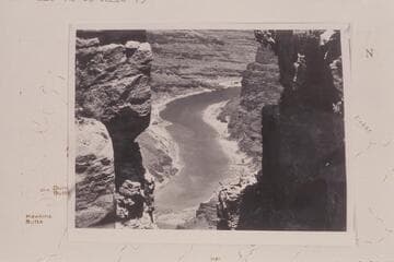 River through cleft in rock; Moran Point. The cleft is the mouth of 75 Mile Creek and shows the river from Mile 74 to Mile 75