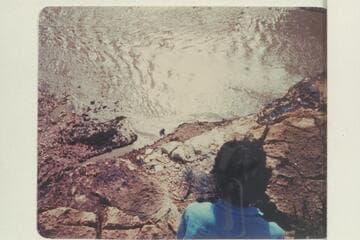 Badger Creek Rapid.  Susie Reilly is the observer