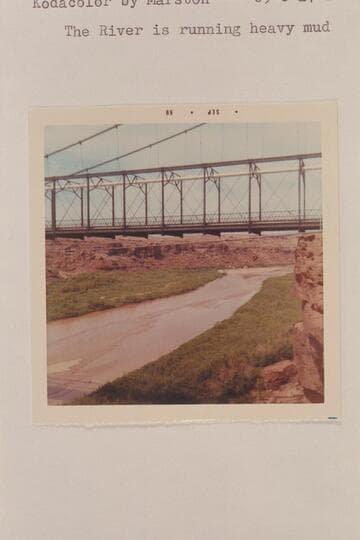 Down river from the new highway bridge at Cameron. The river is running heavy mud