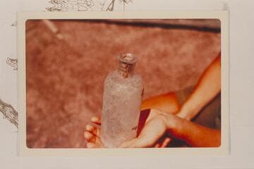 Bottle at the old cabin at Mile 69.7 left bank, about 100 yards from the river