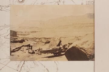 Truck and the boat "Grand" at the south end of the Lees Ferry dugway. Print from the Freeman collection