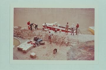 With the freight unloaded, preparations are made to drydock "Big Red" after her bottom was holed at Mile 3 1/2