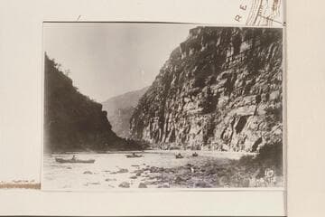 Four boats of the Galloway-Stone party near the lower end of the Canyon of Lodore, about Mile 228. An apparent set-up for a picture