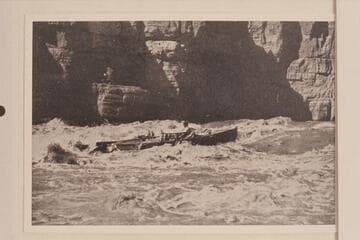In Marble Canyon. Galloway-Stone cruise. The boat is descending stern-first according to Galloway's plan. Dubendorff at the oars. Mr. Stone describes this as "a few brief moments of glorious life."