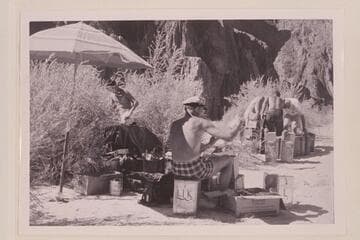 Brian checks the groceries.  Fueling in the background.  Beach at Bright Angel Creek