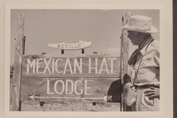 F. E. Masland studied the sign at Mexican Hat