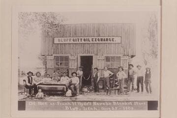 Bluff City Oil Exchange. Oil men at Frank H. Hyde's Navajo blanket store. Bluff City, Utah