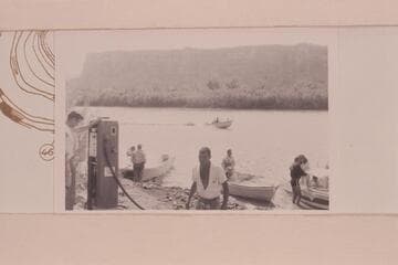 Boats of the CCMRA Friendship Cruise at Mineral Canyon. Mile 50.7, Labyrinth Canyon. It was necessary to stand in line to buy gas and oil