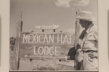 F. E. Masland studies the sign at Mexican Hat