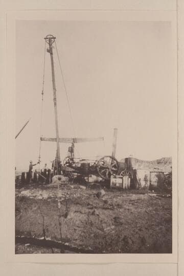 Harshberger rig; Mexican Hat oil field. The negative shows the rock of Mexican Hat at the extreme right