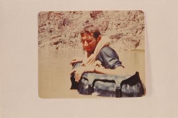 Bill Beer floating on his dunnage bags