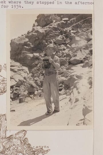 Clyde Eddy.  The Dusty Dozen cruise of that day was from Hermit Creek to a short distance below Elves Chasm and this photo was probably at Shinumo Creek where they stopped in the afternoon
