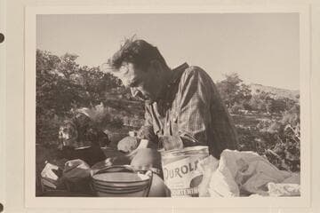 Tom Daly concentrates on the cooking job