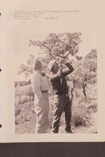 Frank Masland watches Bill Belknap at photography. Road to the Beats Ears
