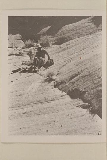 Barry Goldwater sliding on the slick-rock.  Vado Creek