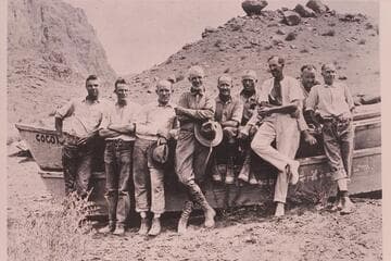 The 1923 USGS Grand Canyon survey party at Lees Ferry before the start of the trip.  [credited to Freeman, who is second from right in photo]  The boats are not those used in the survey