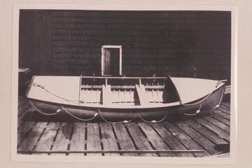 Eddy's pilot boat, the "Dellenbaugh," as she arrived at Greenriver. Parley Galloway was the oarsman of this boat and found it necessary to cut off her keep at the head of Cataract Canyon