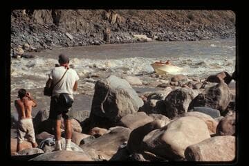 "Wee Red" climbing Dubendorff Rapids