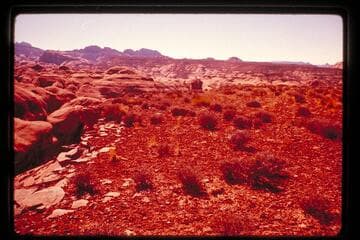 6069 on skyline from top of flat mesa north of trail, north of Cha Butte