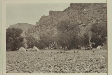 Hole-In-Wall camp, Jack Creek, Mile 69.85. The hole in the wall can be seen upper left