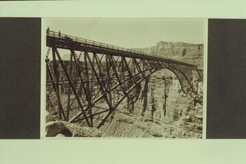 Navajo Bridge. Mile 4-5, Marble Canyon. The construction started August of 1927 and was completed January 1929. Dedication was 1929, June 14-15. Photo from Freeman collection