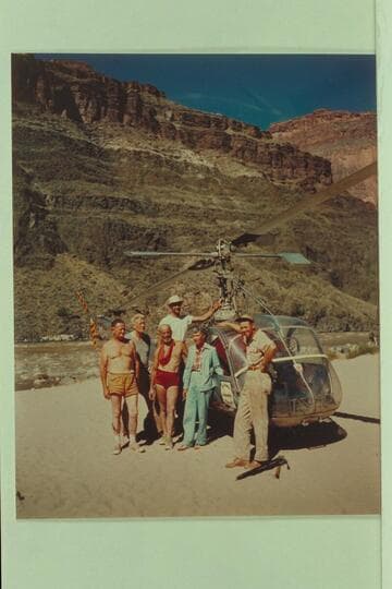 Helicopter and crew on beach at Tapeats Creek. Left to right: Taylor, Desloge, Marston, Forcier, Margaret Marston and "Red" Carson