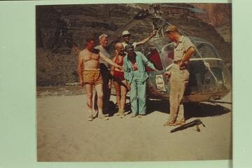Helicopter and crew on beach at Tapeats Creek. Left to right: Taylor, Desloge, Marston, Forcier, Margaret Marston and "Red" Carson