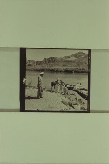 The boats being rigged for the motor traverse of the Canyon. Left to right: Sanderson; Belknap; Marston; Masland' Jordan. The boats are the "Bootoo" and the "Cactus."