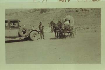 Setting up the picture of The Old and The New. Dedication of the Marble Canyon Bridge. Print from Freeman collection