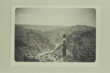 Desolation Canyon, 114 miles below Jensen, Utah.  A climb-out in Desolation.  The girl is Mildred Davis