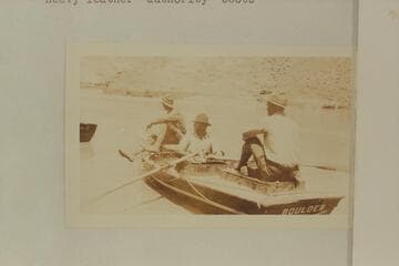 Birdseye, Lint, and Burchard in the "Boulder" at Lees Ferry. Print from Freeman collection. Birdseye and Burchard are wearing the dangerous breeches and heavy leather "authority" boots