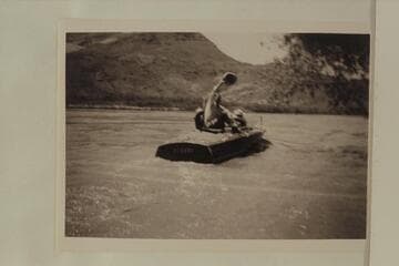 Marston's motorboat "Hudson" pulls out from the landing at Lees Ferry, starting a transit of the Canyon. The crew is made up of Joseph Desloge; Guy Forcier; Dock Marston; Jordan Rust. Lees Ferry gauge: 51,800 cfs