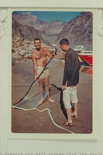 Garth Marston and Bill Austin with the shield of the "WEE RED" after Bill dove her into a hole in Monument Creek Rapid