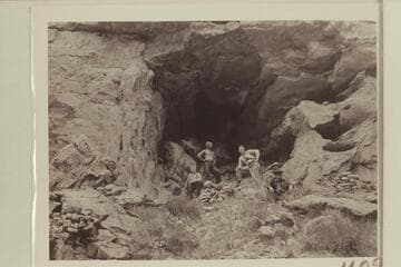 At the mouth of Stanton Cave. Bruce Wilson; Nevills; Hudson; Marston back of Olsen