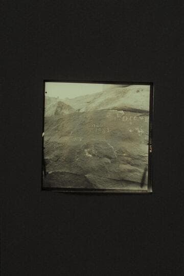 The sign and the inscription at Browns Riffle. Mile 12. Marble Canyon